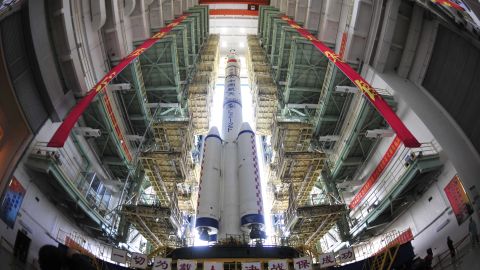 The Shenzhou X spacecraft, carried by a Long March-2F carrier rocket, is installed at the launch pad in Jiuquan, China, in June 2013. The spacecraft carried three astronauts to visit the Tiangong-1 space module. China's space program has launched more than 130 systems in the past few years, including spy satellites and a new navigation system that would provide an alternate to GPS.