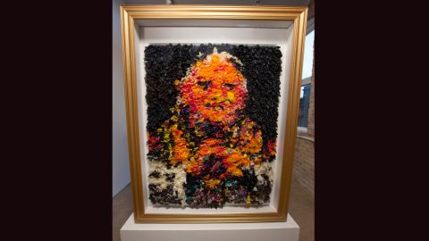 The case allows viewers to see the back of the portrait and the condoms, which may lessen stigmas about them.