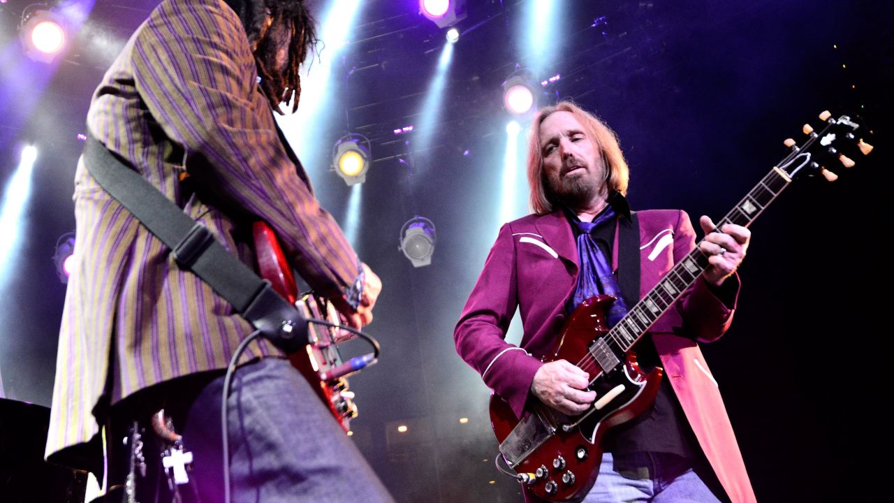 This band chose "American Girl" as the first song to be played at Live Aid's U.S. venue, JFK Stadium in Philadelphia. Tom Petty, right, here playing with longtime band mate Mike Campbell in 2014, launched a 40th anniversary tour in 2017. 