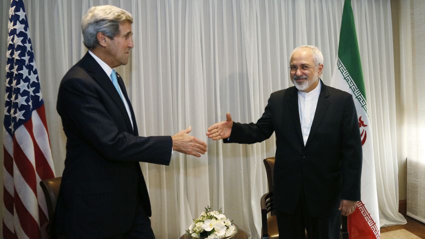 Iranian Foreign Minister Mohammad Javad Zarif (R) shakes hands on January 14, 2015 with US State Secretary John Kerry in Geneva. Zarif said on January 14 that his meeting with his US counterpart was vital for progress on talks on Tehran's contested nuclear drive. Under an interim deal agreed in November 2013, Iran's stock of fissile material has been diluted from 20 percent enriched uranium to five percent, in exchange for limited sanctions relief.