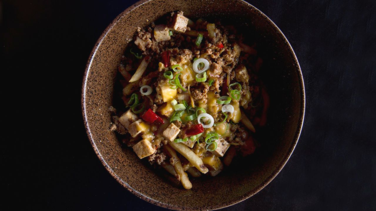 King Noodle's mapo tofu chili cheese fries combine American cheese, ground pork and French fries with the classic Sichuanese tofu stew. 