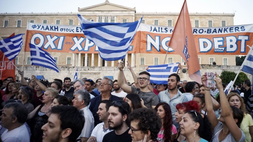 Caption:ATHENS, GREECE - JUNE 29: Demonstrators during a rally in Athens, Greece, 29 June 2015. Greek voters will decide in a referendum next Sunday on whether their government should accept an economic reform package put forth by Greece's creditor. Greece has imposed capital controls with the banks being closed untill the referendum. (Photo by Milos Bicanski/Getty Images)