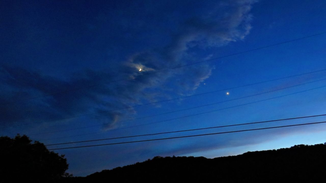 iReporter Lonna Ours took these photos of Venus and Jupiter on June 21. The two planets are moving closer together throughout the month of June and will eventually appear to converge.