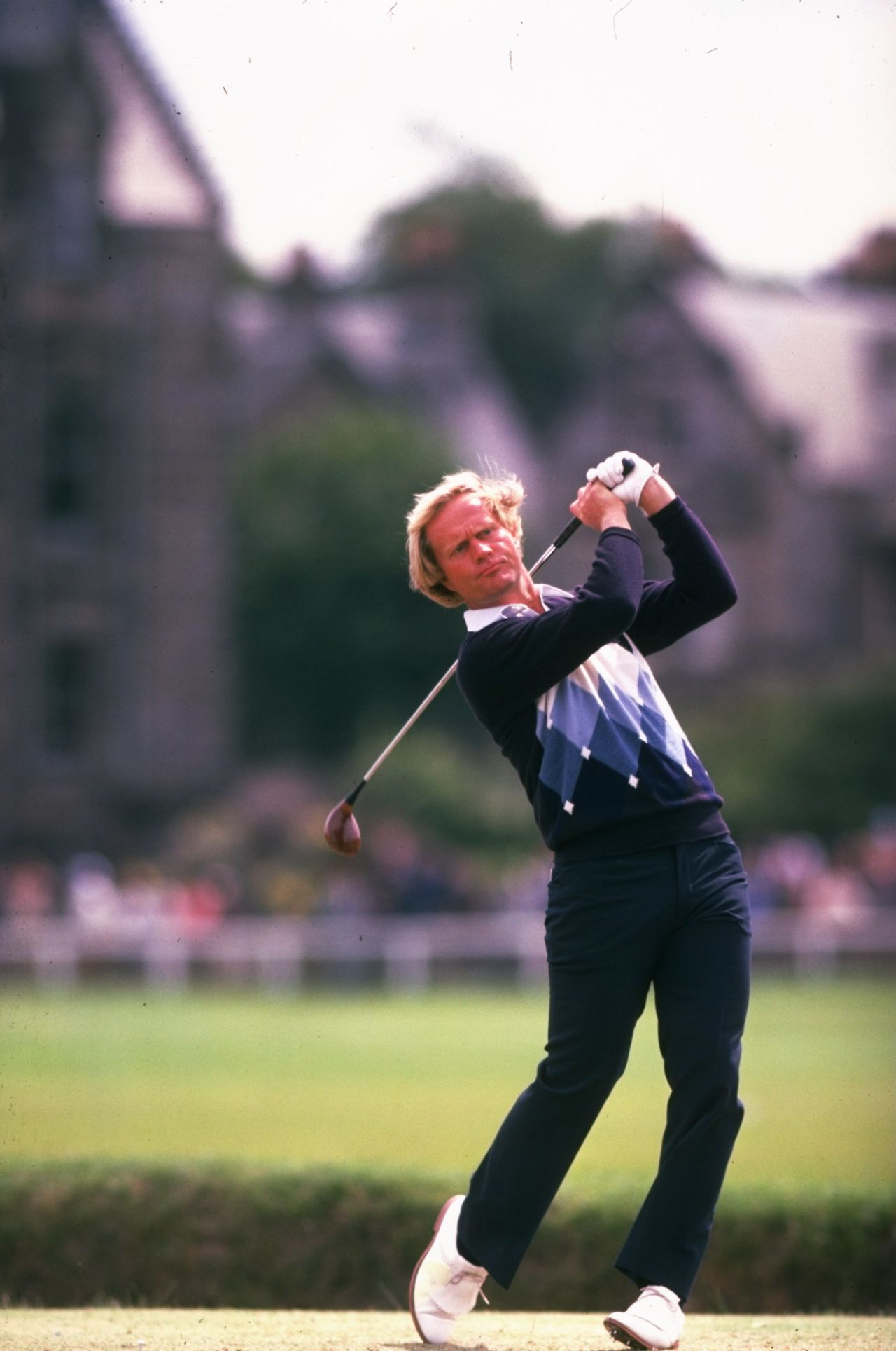 Palmer's exploits in the UK inspired a young Jack Nicklaus to compete at the Open Championship. The 18-time major champion is pictured here at St. Andrews' Old Course in 1978, when he would win his third and final Claret Jug. Both Nicklaus, dubbed the "Golden Bear," and Arnold "The King" Palmer would exploit their on-course success with profitable clothing businesses off it.  