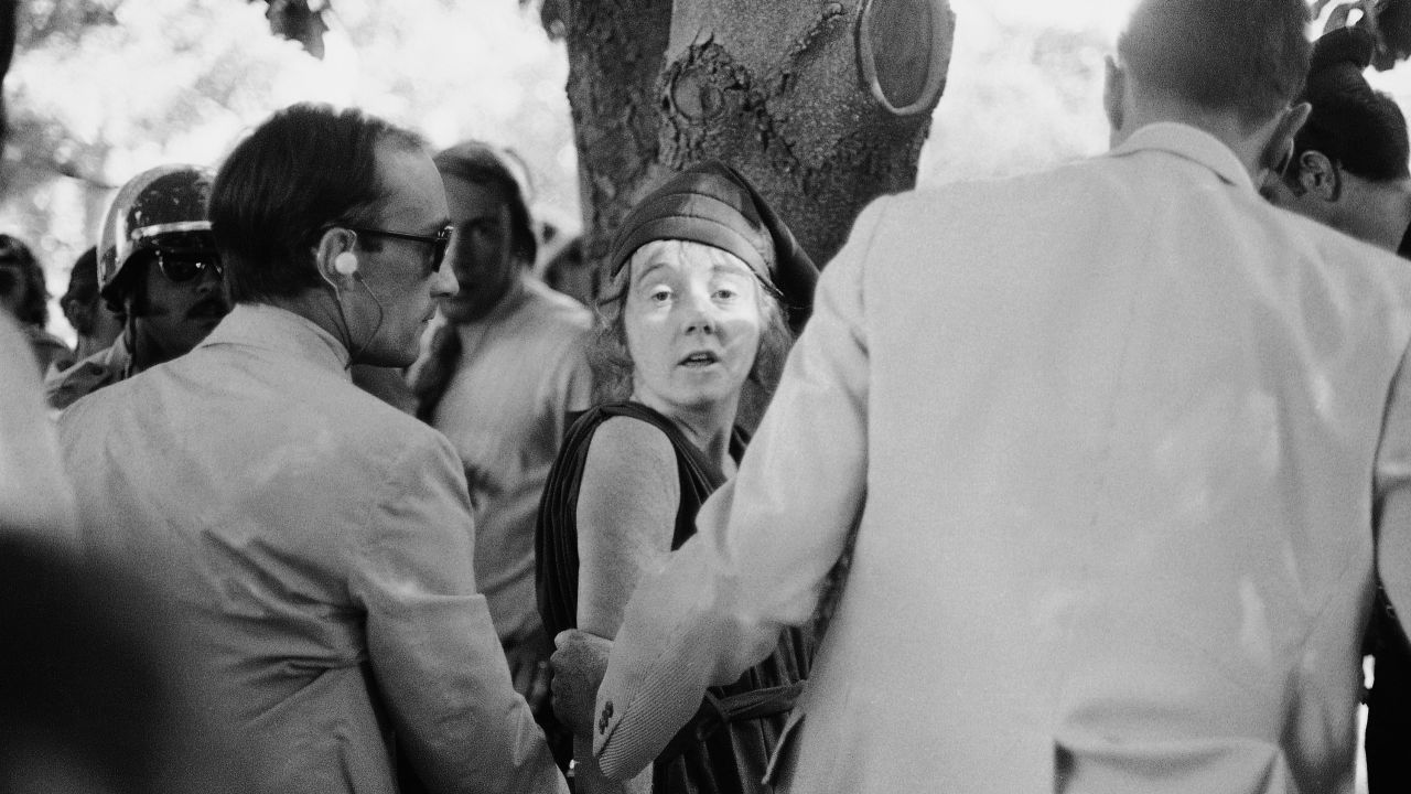 U.S. Secret Service agents lead away Lynette "Squeaky" Fromme, a member of Charles Manson's "family," after she allegedly pointed a .45-caliber pistol at Presisdent Gerald Ford on the grounds of the California State Capitol in 1975. According to Jeff Guinn, author of "Manson," her first words after the being wrestled to the ground were, "Can you believe the gun didn't go off?" Fromme was paroled in 2009.