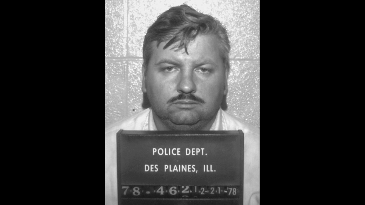 John Wayne Gacy's police arrest photo from Dec. 21, 1978. Gacy was convicted of killing 33 young men and boys between 1972 and 1978.  Before his arrest, Gacy had been active in the Democratic Party and had dressed as a clown to entertain children at parties. While on death row, Gacy took up painting. His pictures of clowns sold for between $200 and $20,000. Gacy was executed in 1994 by lethal injection. 
