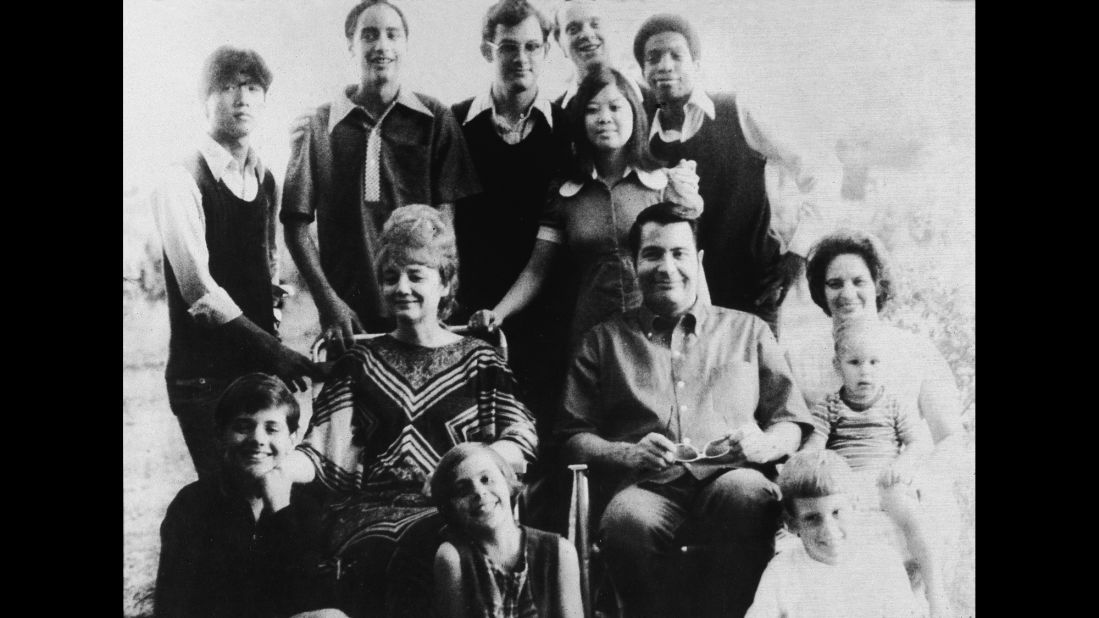 Portrait of American religious leader Jim Jones, the founder of the People's Temple, and his wife, Marceline Jones, seated in front of their adopted children and next to his sister-in-law, right, with her three children. In 1977, Jones relocated the People's Temple from San Francisco, California, to Jonestown, Guyana. He led the mass suicide of over 900 followers on November 18, 1978, before dying of a gunshot wound later that day. 