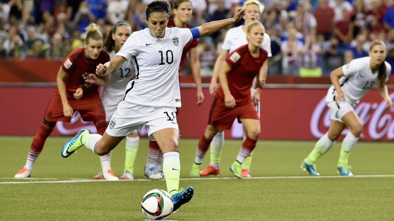 Carli Lloyd scores the Americans' opening goal from a penalty.