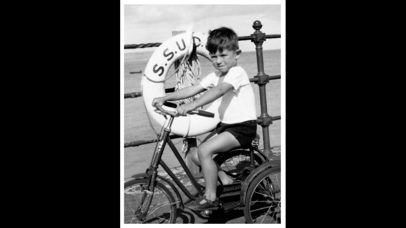 Keith Richards, 4, rides a bike on a family holiday at Southend-on-Sea, England, in 1947. The guitarist met Jagger while the two were in primary school, a friendship that budded into the world-renowned rock band.
