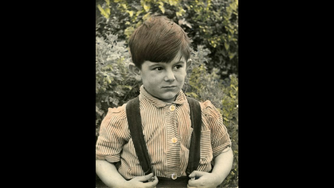 Wood, age 4, at his London home in 1951. By the time he joined the Stones, he had established himself as a musician, having already played with The Birds and the Faces.