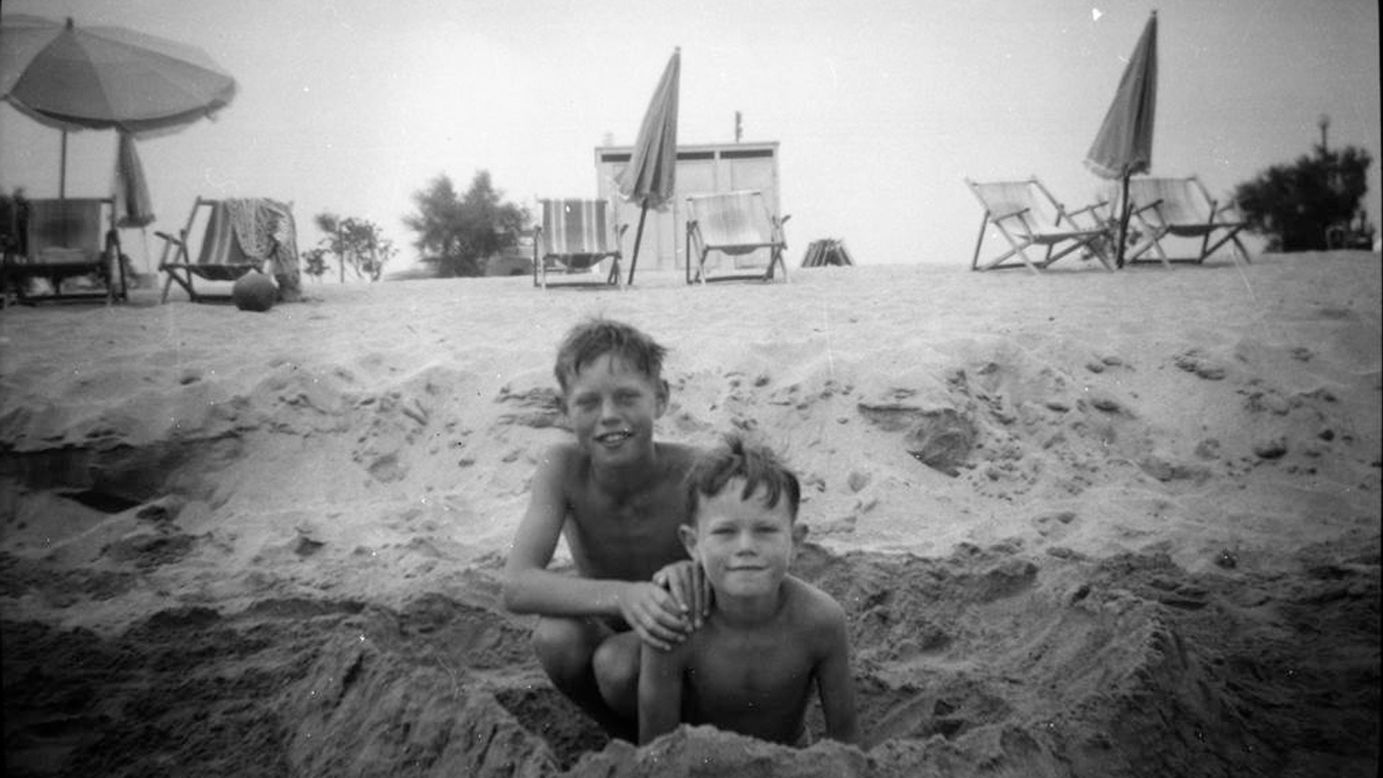 An 8-year-old Jagger, left, plays at the beach with his younger brother Chris in 1951. Chris is also a musician and has worked as a clothing designer and journalist.
