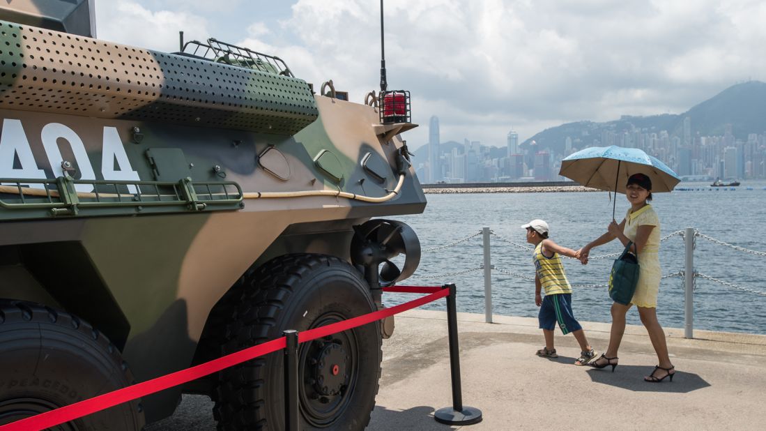 It's an unusual military display next to Hong Kong's typically placid harbor.