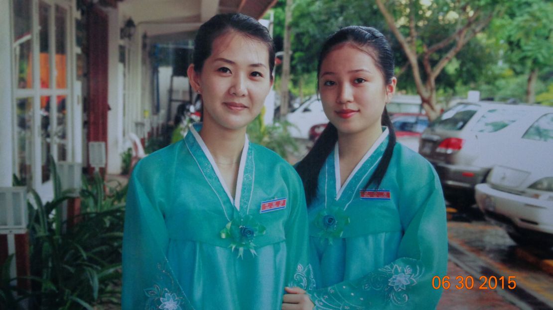 Undated photo of Mun Su Gyong (right) outside the restaurant in Phnom Penh.