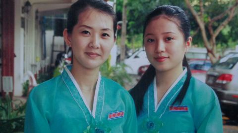 Undated photo of Mun Su Gyong (right) outside the restaurant in Phnom Penh.
