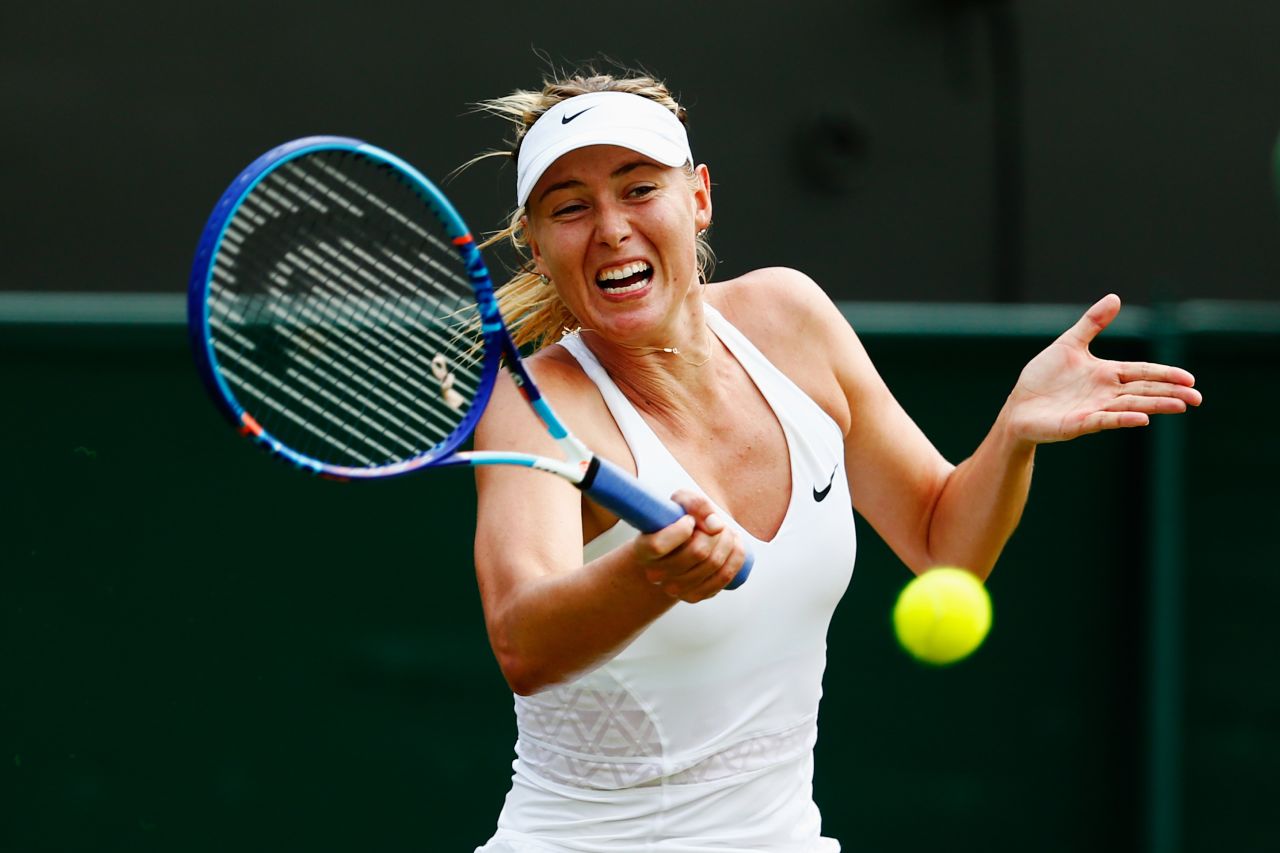 Maria Sharapova moved into the third round at Wimbledon on Wednesday by crushing Dutch qualifier Richel Hogenkamp on another steamy day in London. 