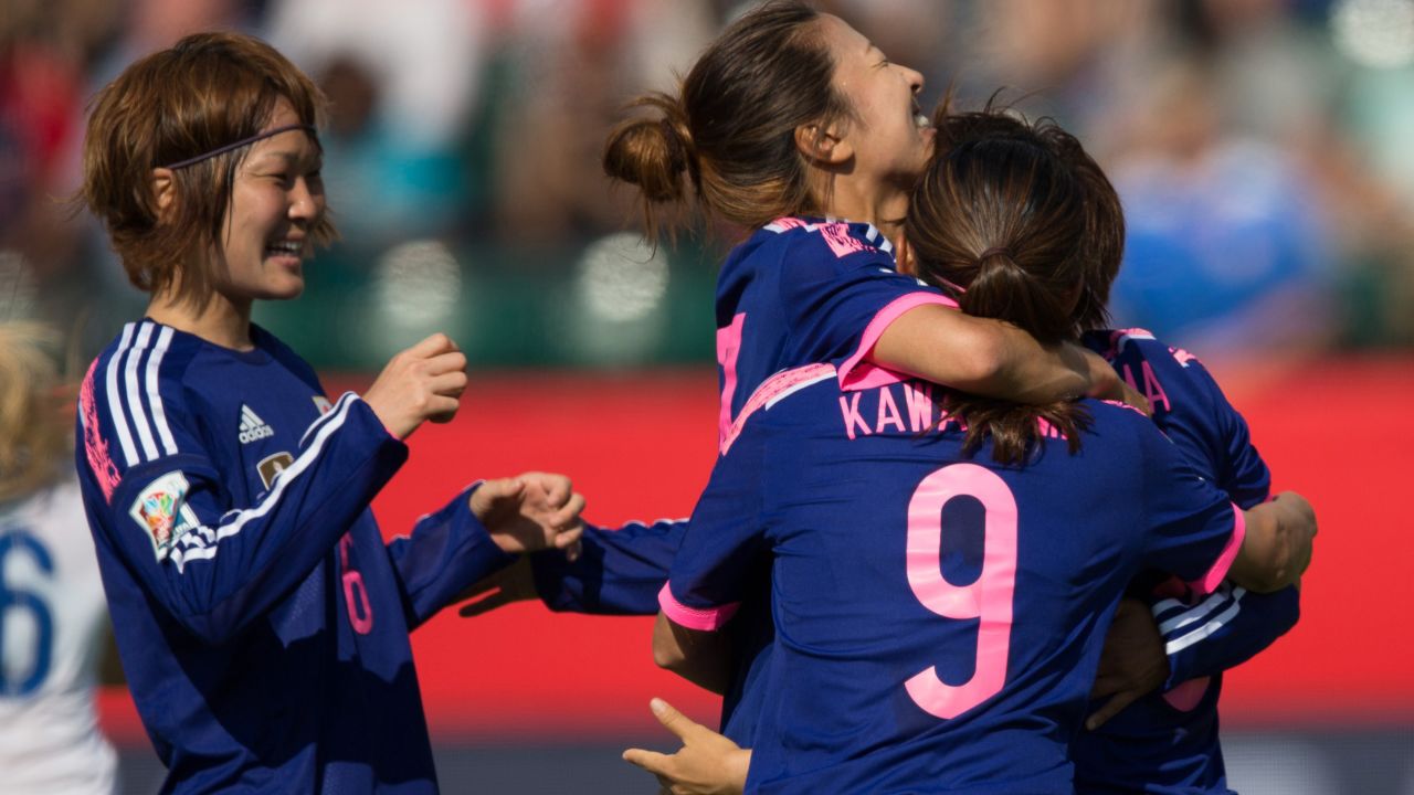 Japanese players celebrate their first-half goal against England during a Women's World Cup semifinal on Wednesday, July 1. Japan, the defending World Cup champions, won 2-1 after a late-minute own goal by England's Laura Bassett.