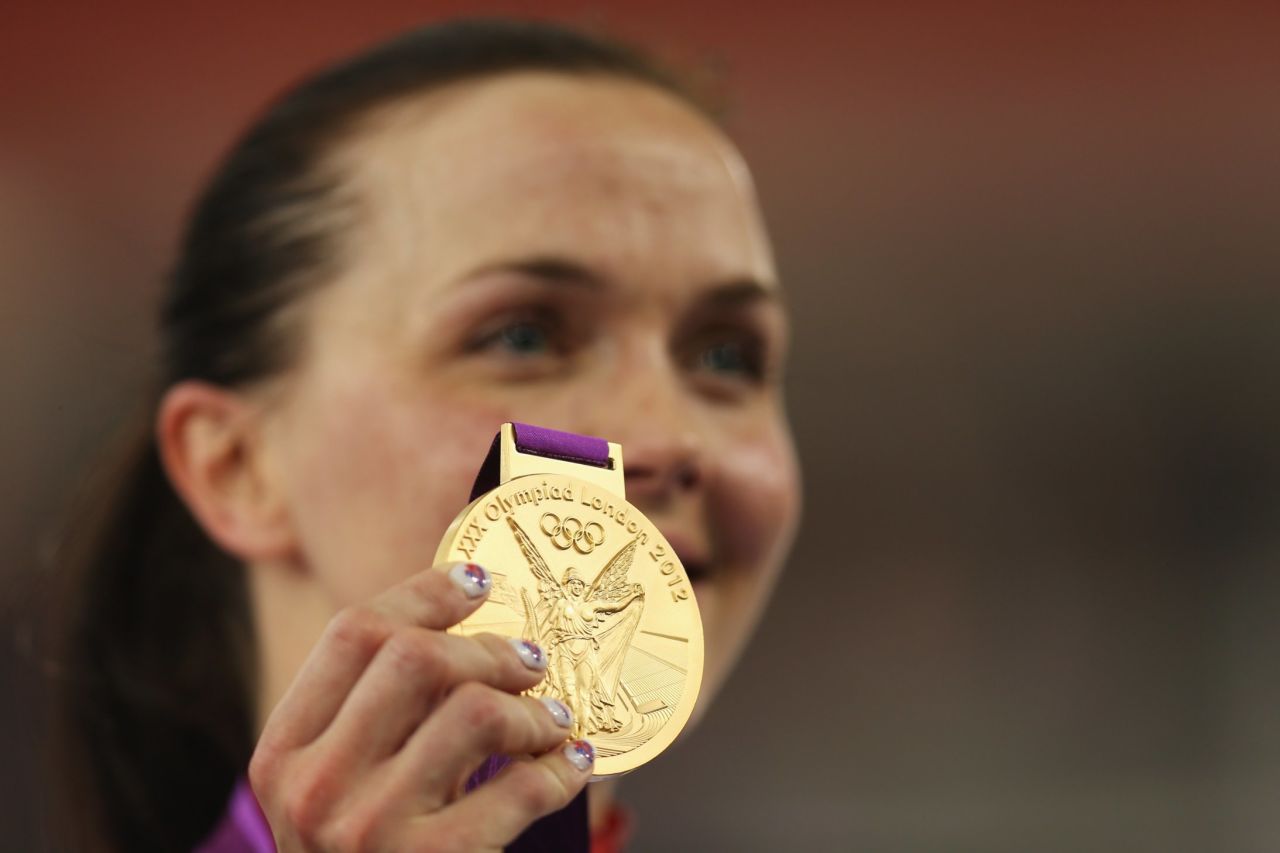 Pendleton shows off her gold medal won in the Keirin competition at the 2012 London Games. The Briton is the most successful British female Olympian ever winning two golds and one silver. 