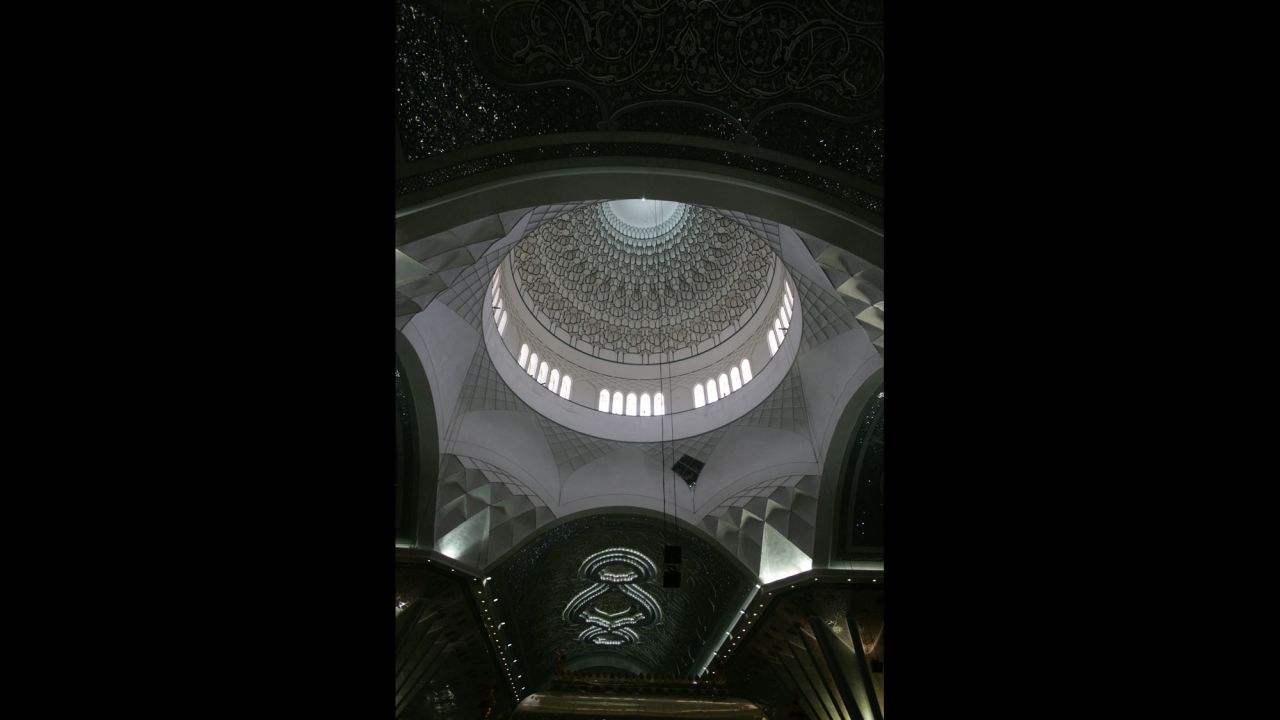 The dome of the shrine over Khomeini's mausoleum. The exterior of the newly constructed dome is still under scaffolding, the final golden tiles being laid.