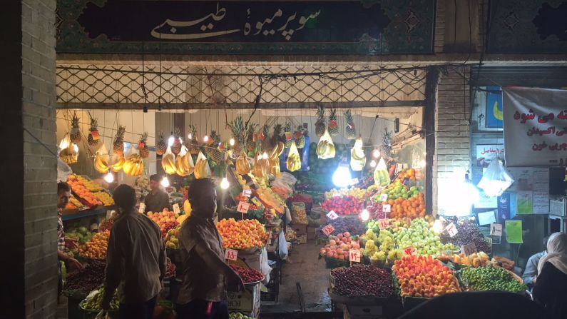 Market stalls heave with fresh fruit in Tehran, aiming to satisfy observant Muslims who have been fasting all day.