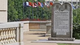 The Ten Commandments monument is pictured at the state Capitol in Oklahoma City, Tuesday, June 30, 2015. Oklahoma's Supreme Court says the monument must be removed because it indirectly benefits the Jewish and Christian faiths in violation of the state constitution. 