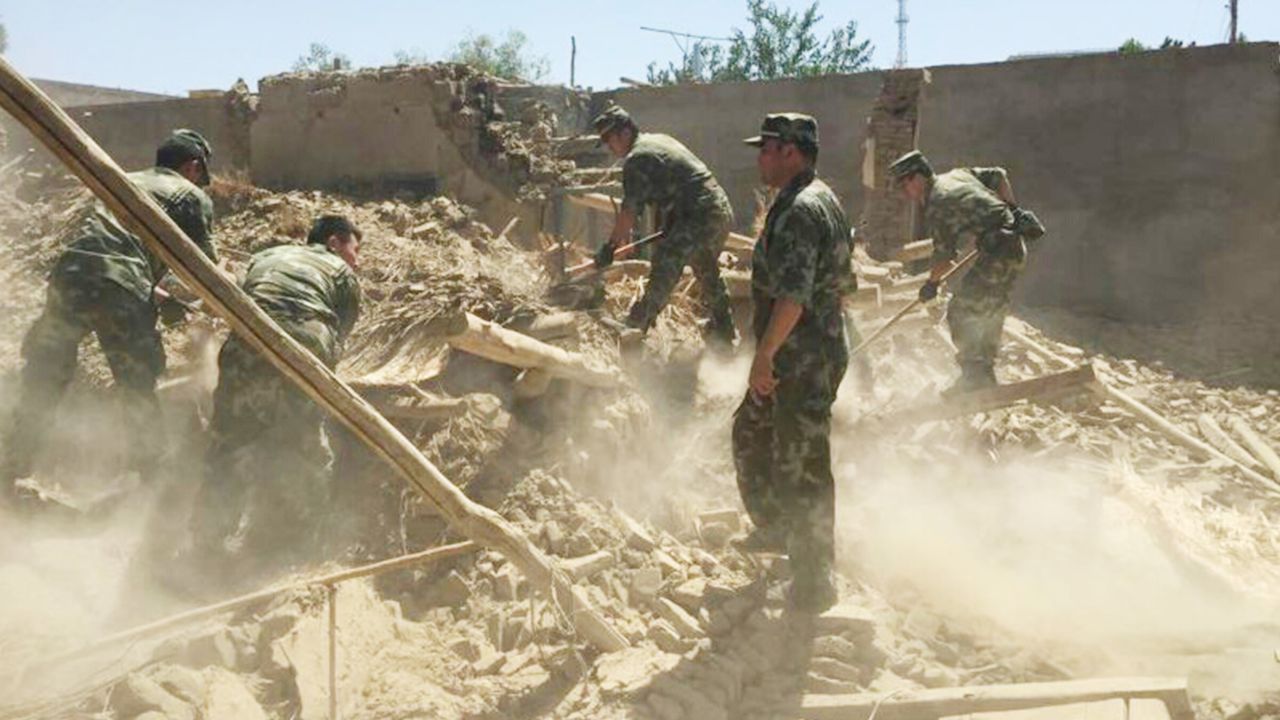 Chinese soldiers carry out rescue work after Friday's earthquake. 