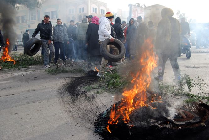 Kasserine was known for its central role in the 2011 Tunisian revolution. Here, residents burn tires during a 2013 protest calling for compensation after the overthrow dictator Zine el Abidine Ben Ali. 