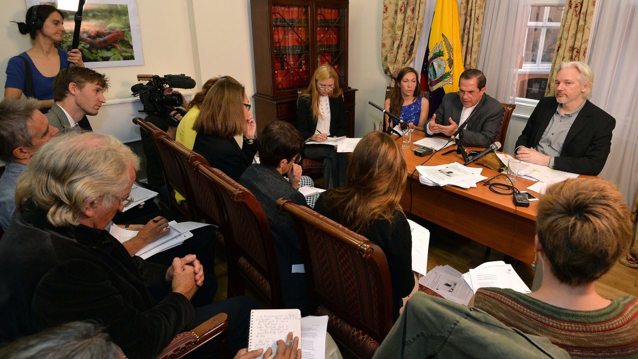 Assange attends a news conference inside the Ecuadorian Embassy in London in August 2014.