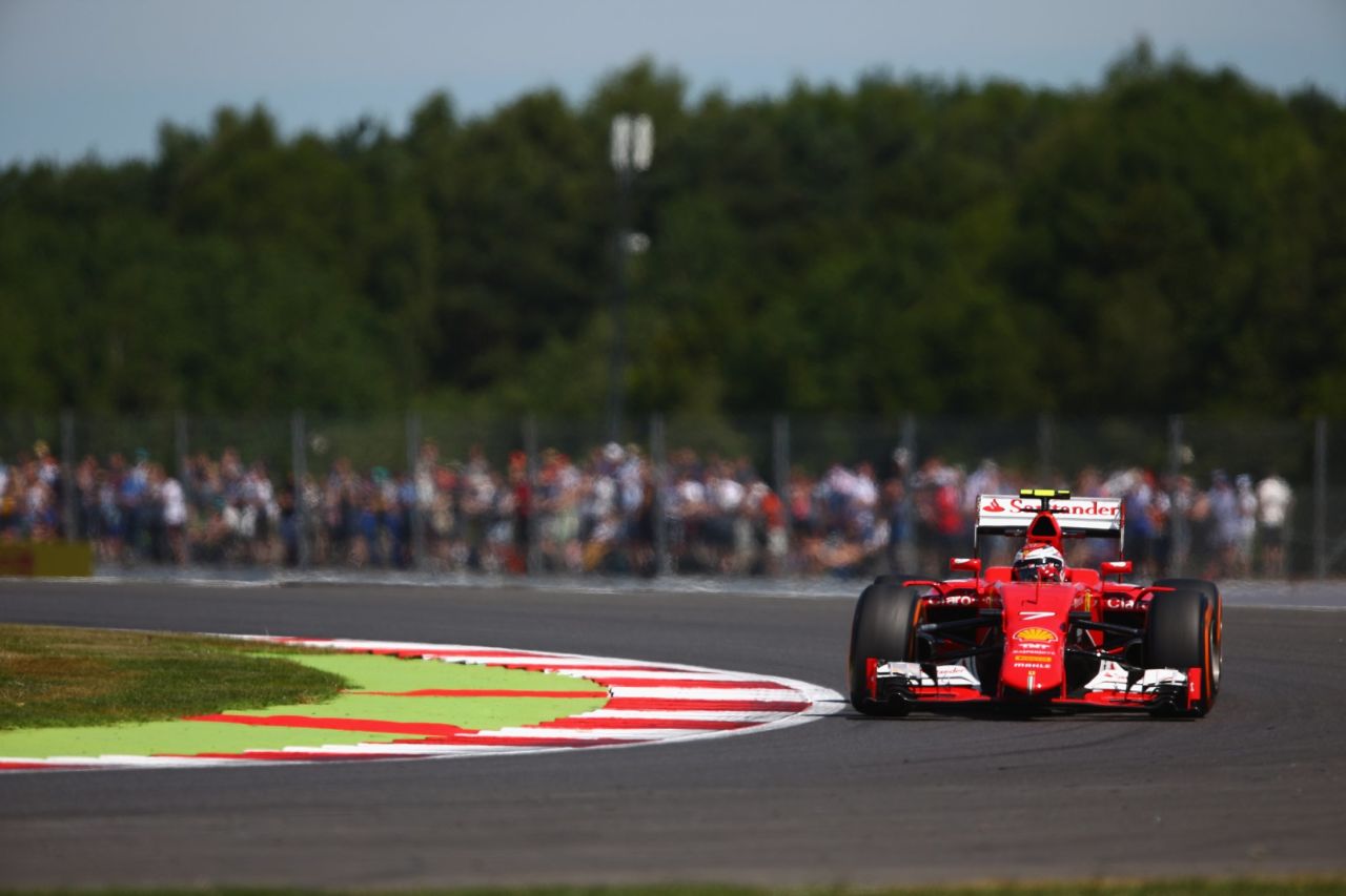 Ferrari's Kimi Raikkonen pipped team-mate Sebastian Vettel by 0.02secs to go second on an encouraging day for the Italian team.