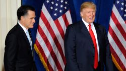 Republican presidential candidate, former Massachusetts Gov. Mitt Romney (L) and Donald Trump arrive at a news conference held by Trump to endorse Romney for president at the Trump International Hotel & Tower Las Vegas February 2, 2012 in Las Vegas, Nevada.