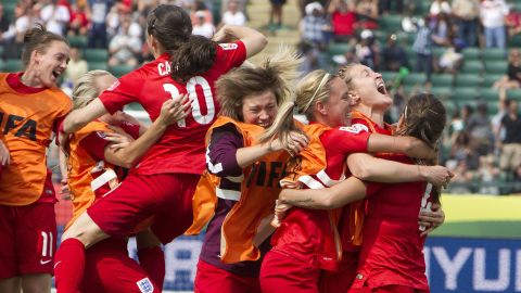 England celebrates a penalty kick goal against Germany during extra time at the Women's World Cup soccer third-place match in Edmonton, Alberta, on Saturday, July 4. England defeated Germany with a final score of 1-0.