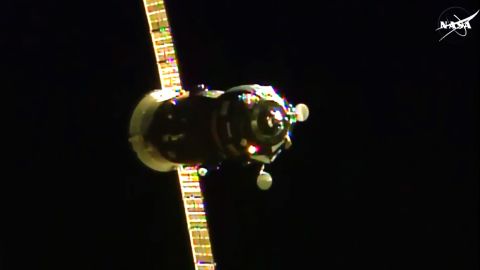 The Russian Progress 60 cargo craft is seen approaching the International Space Station.