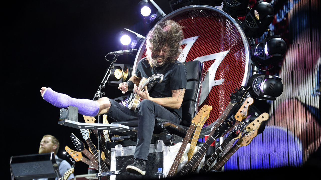 Foo Fighters frontman Dave Grohl sprang from the D.C. punk scene to become a member of Nirvana, a producer extraordinaire and a generally well-respected guy in the music business. Here, Grohl performs at RFK Stadium in Washington on July 4, 2015. The cast is for a broken leg caused by falling off a stage. Click through to see more from Grohl's career. 