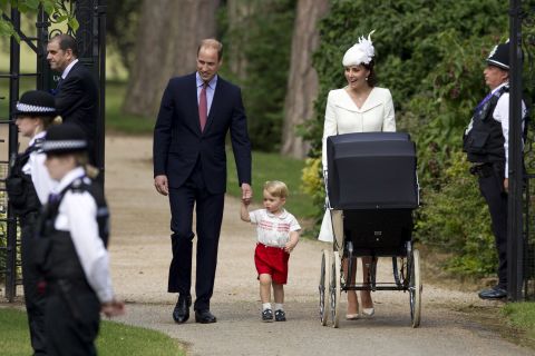 Catherine, Duchess of Cambridge, Prince William, Duke of Cambridge, Princess Charlotte of Cambridge and Prince George of Cambridge arrive at the Church of St Mary Magdalene on the Sandringham Estate for the Christening of Princess Charlotte of Cambridge in King's Lynn, England, on July 4.