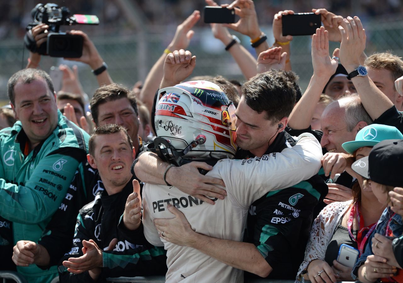Hamilton shared his moment of victory with his Mercedes pit crew who played such a key role.