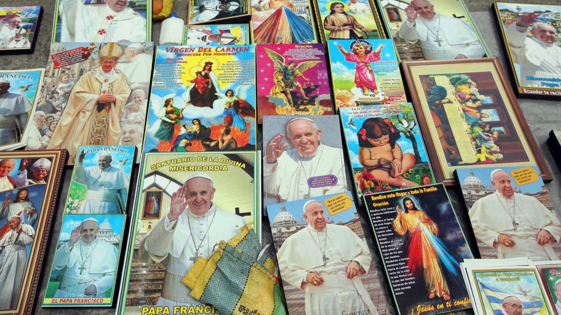 Images of the Pope are sold outside of Samanes Park on July 5.