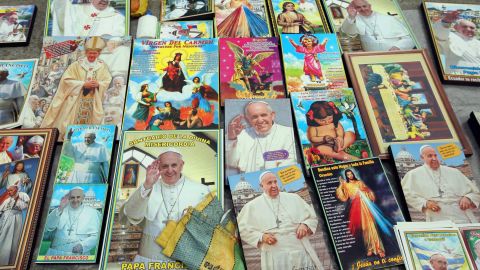 Images of the Pope are sold outside of Samanes Park on July 5.