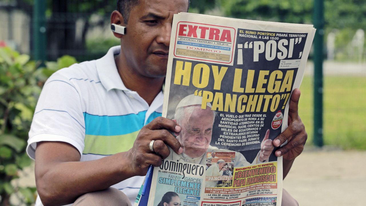 A man reads a newspaper outside the Samanes Park where Pope Francis will give a mass on Sunday.