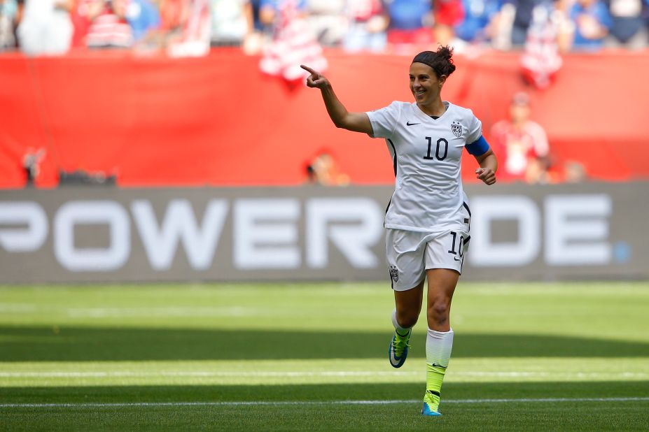 Lloyd celebrates scoring the opening goal against Japan.