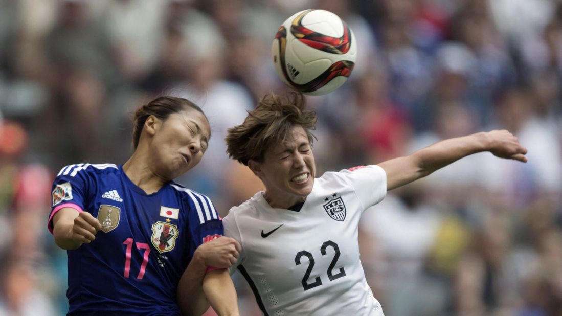 Japan's Yuki Ogimi and United States' Meghan Klingenberg vie for the ball during the second half.