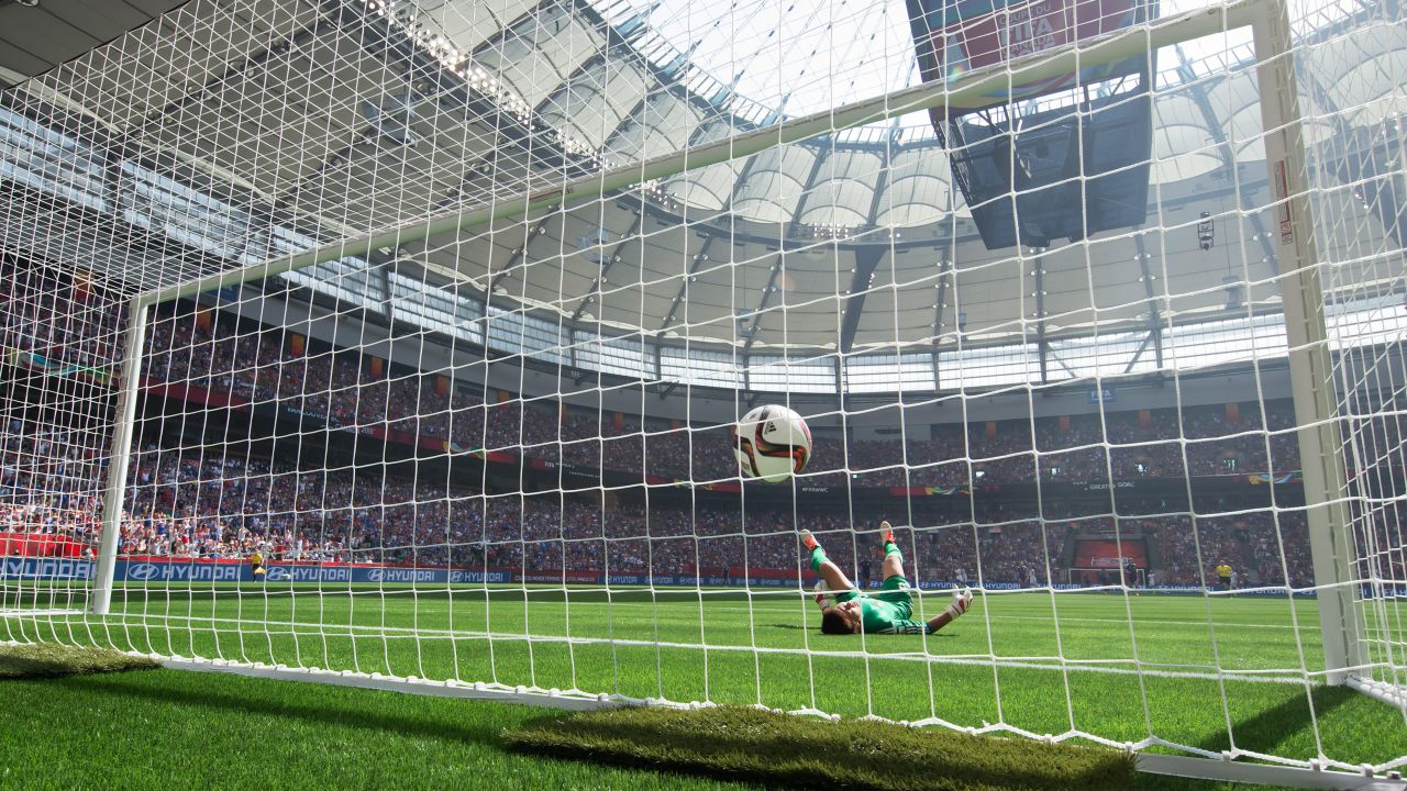 Japan goalkeeper Ayumi Kaihori allows a third goal to United States' Carli Lloyd during the first half.