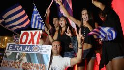 Caption:ATHENS, GREECE - JULY 06: People celebrate in front of the Greek parliament as the people of Greece reject the debt bailout by creditors on July 6, 2015 in Athens, Greece. The greek people have rejected a debt bailout in a referendum with nearly 62% voting 'No', against 38% voting 'Yes' according to interior ministry figures (Photo by Christopher Furlong/Getty Images)