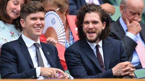 Kit Harington, right, sits in the Royal Box on Centre Court at the 2015 Wimbledon Championships.