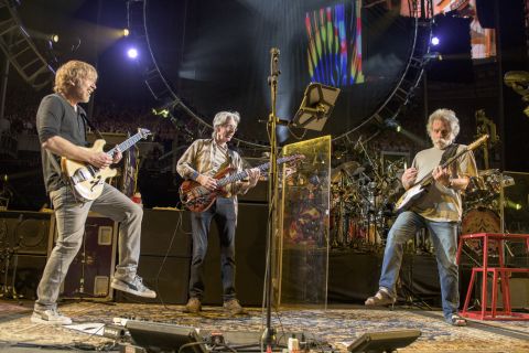 Phish guitarist Trey Anastasio, left, plays with Lesh and Weir at the "Fare Thee Well" show in Chicago on Saturday, July 4.