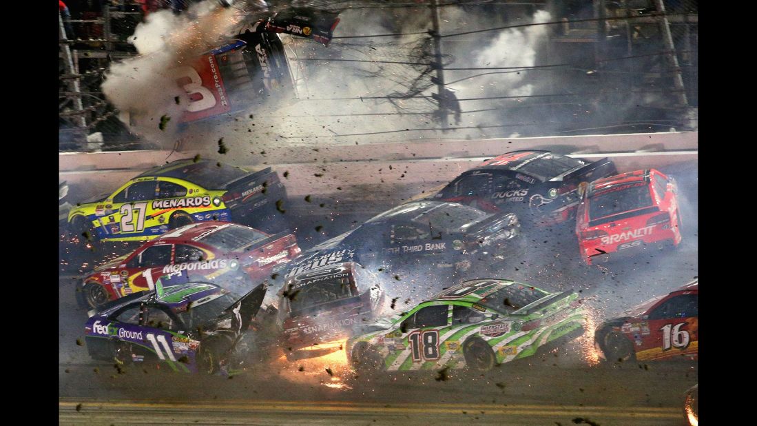 Austin Dillon, driver of the No. 3 Chevrolet,<a href="http://www.cnn.com/2015/07/06/us/daytona-race-crash/index.html"> slams into the catch fence </a>during the final lap of the NASCAR Coke Zero 400 at Daytona International Speedway in Daytona Beach, Florida, early on Monday, July 6. One spectator was sent to the hospital with injuries. Dillon walked away from the wreck.