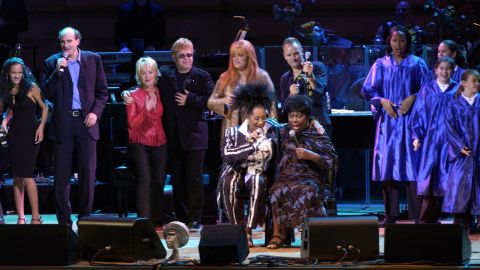 Patti LaBelle, bottom left, sings with Simone during the 2002 Rainforest Foundation Concert in New York. In the top row, from left, are Anoushka Shankar, James Taylor, Lulu, Sir Elton John, Wynonna Judd and Sting.