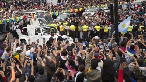 The Pope greets supporters in downtown Quito on Sunday, July 5.