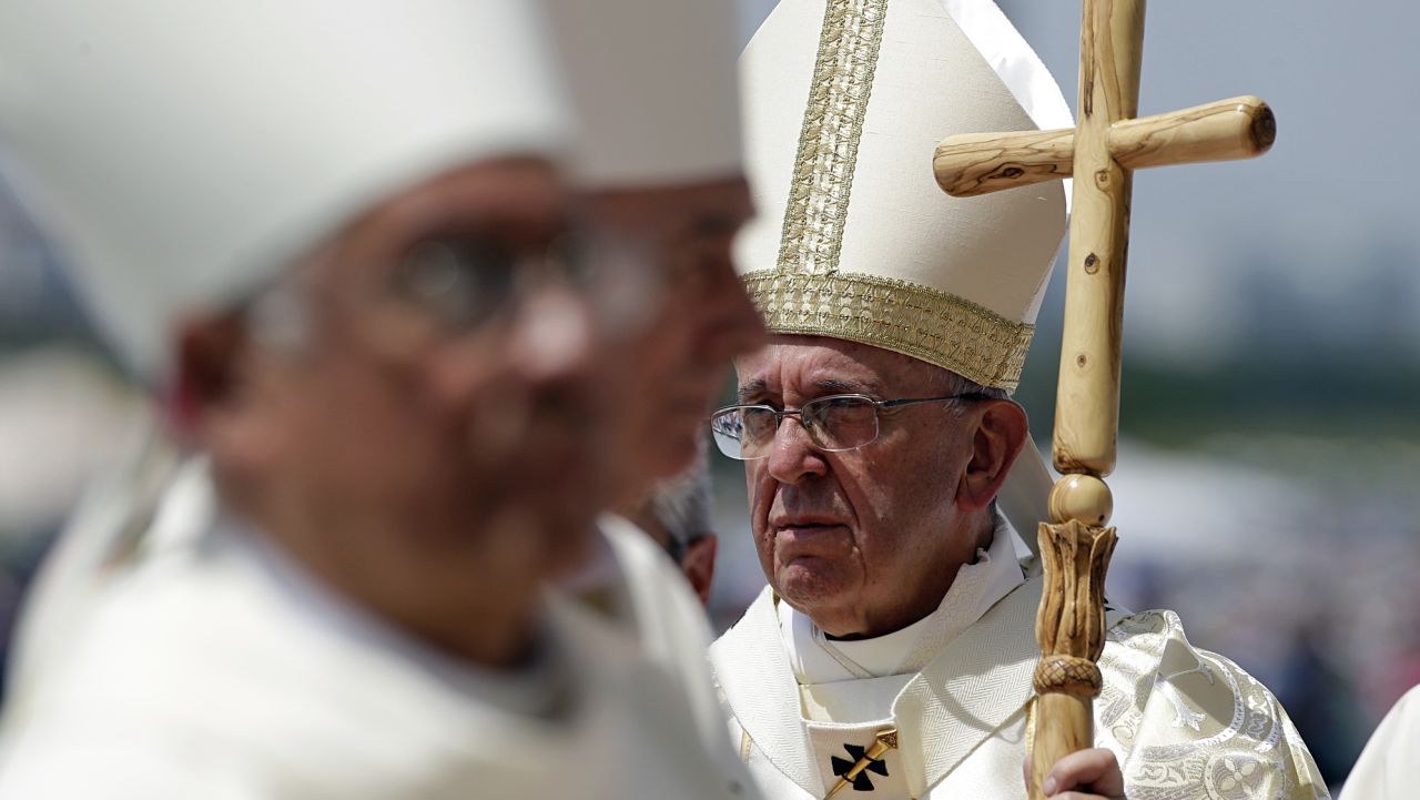 Pope Francis walks with his pastoral staff to celebrate a Mass in Guayaquil, Ecuador, Monday, July 6, 2015. Latin America's first pope arrived in this port city on Monday for the first big event of a three-nation tour where he's set compassion for the weak and respect for the environment as central themes. (AP Photo/Gregorio Borgia)