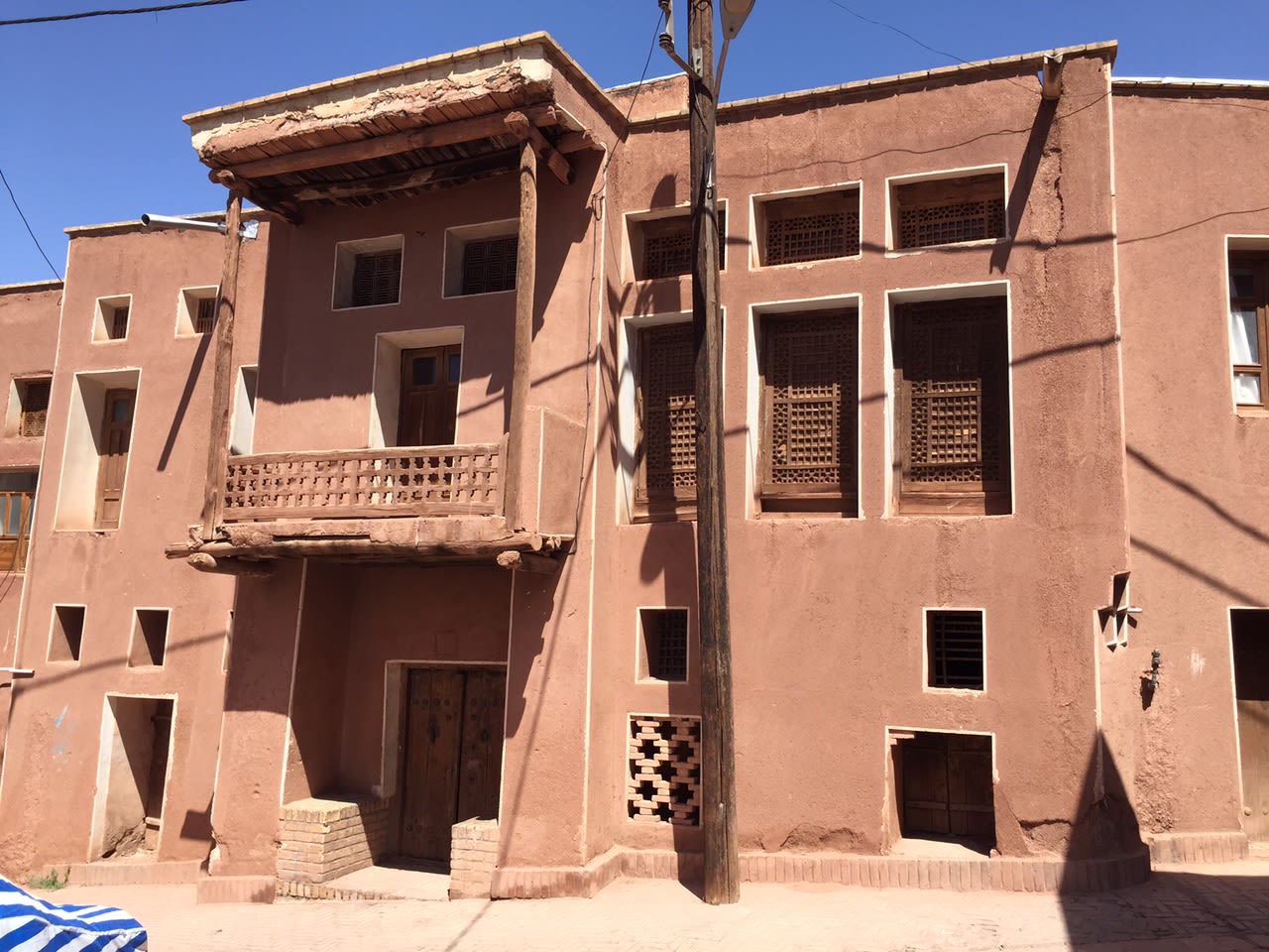 The buildings get their unique, red color from mud bricks.
