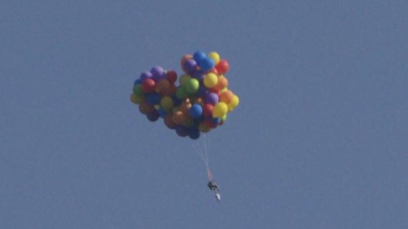 balloons tied to lawn chair