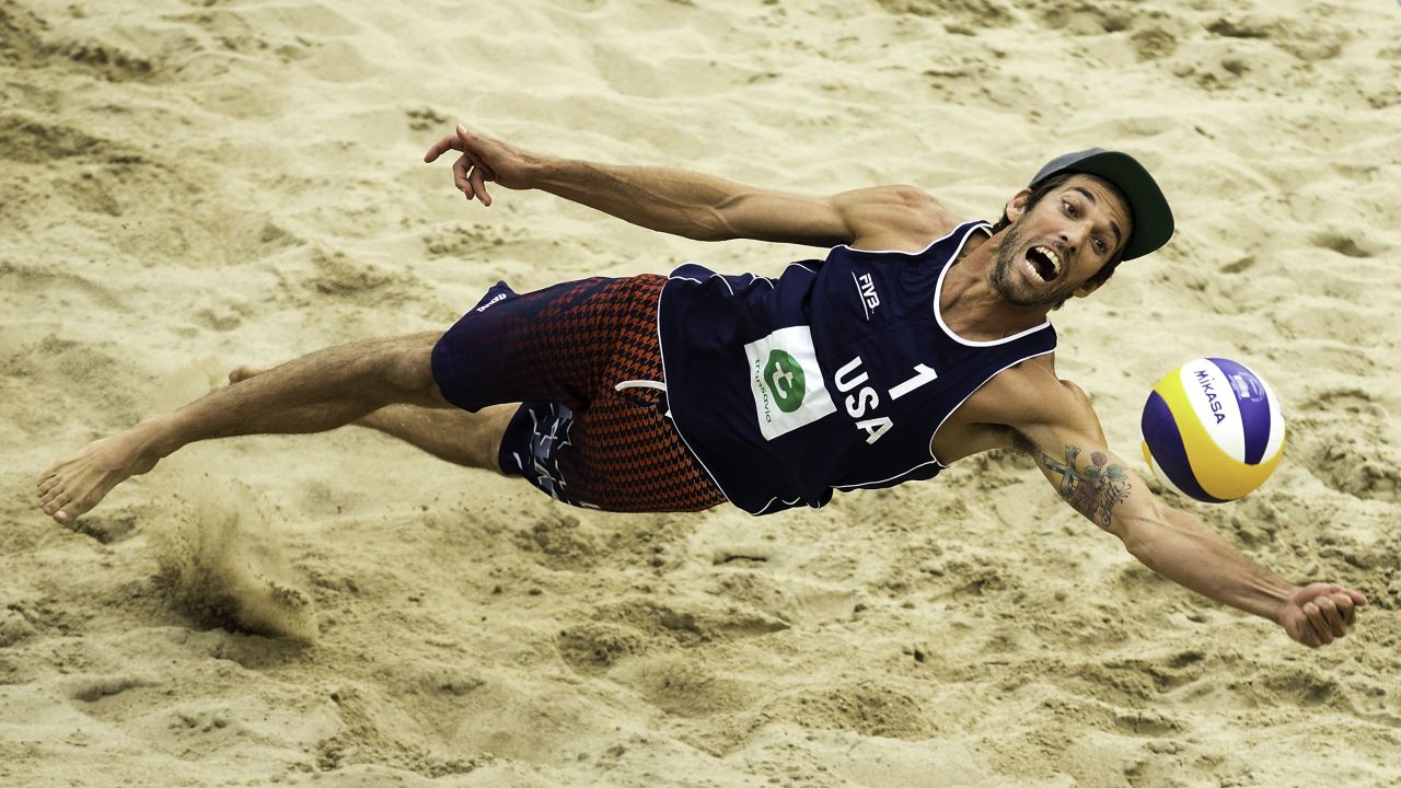 Nicholas Lucena dives for a ball Thursday, July 2, while playing against a team from Qatar in the Beach Volleyball World Championships. The tournament took place in the Netherlands.